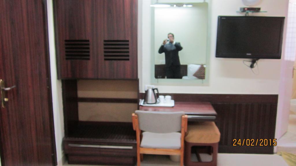 Empire Hotel Bombay Habitación foto