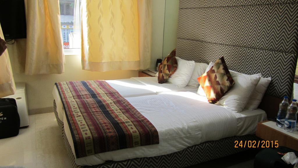 Empire Hotel Bombay Habitación foto